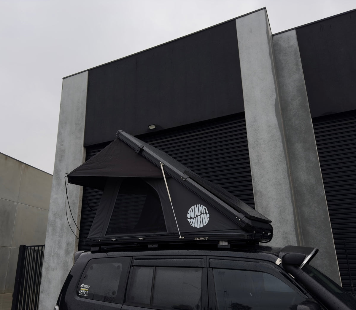 Summit touring The Nest V2 rooftop tent on Pajero